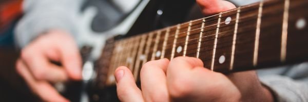 Beginner guitars, starter packs, lessons, affordable instruments, friendly staff.